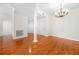 Bright living room with hardwood floors and a decorative chandelier at 50 Biscayne Nw Dr # 2113, Atlanta, GA 30309