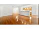 Open concept living space with gleaming hardwood floors and easy access to the kitchen at 50 Biscayne Nw Dr # 2113, Atlanta, GA 30309