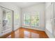 Cozy sun room with large windows and hardwood floors at 50 Biscayne Nw Dr # 2113, Atlanta, GA 30309
