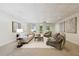 Finished basement living area with neutral paint, plush carpet, and access to the backyard at 508 Hastings Dr, Peachtree City, GA 30269