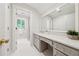 Bathroom featuring a white tile floor, bright vanity, and a glass shower at 508 Hastings Dr, Peachtree City, GA 30269