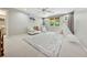Neutral bedroom featuring plush carpet, a white crib, and a decorative tent at 508 Hastings Dr, Peachtree City, GA 30269