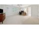 Spacious bedroom with a desk, chair, television and neutral carpet at 508 Hastings Dr, Peachtree City, GA 30269