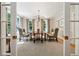 Elegant dining room featuring a round table, chandelier, and decorative wall art for a sophisticated ambiance at 508 Hastings Dr, Peachtree City, GA 30269