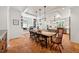 Dining room featuring a large table, many chairs, and a view to the outdoors through a window at 508 Hastings Dr, Peachtree City, GA 30269