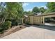 View of the exterior highlighting the gray paint and welcoming screened porch at 508 Hastings Dr, Peachtree City, GA 30269