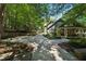 Two-story home with lush landscaping, charming flag, and inviting front porch at 508 Hastings Dr, Peachtree City, GA 30269