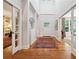 Stately foyer with hardwood floors, a decorative art piece, and a view to other rooms at 508 Hastings Dr, Peachtree City, GA 30269