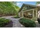 Inviting front porch with swing, seating, and view of the landscaped yard at 508 Hastings Dr, Peachtree City, GA 30269