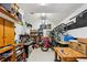 The garage has high ceilings and lots of room for bikes and a workbench at 508 Hastings Dr, Peachtree City, GA 30269