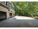 Spacious three car garage with a balcony overlooking the wooded lot at 508 Hastings Dr, Peachtree City, GA 30269