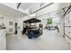 The garage features lots of wall space and storage, perfect for a golf cart at 508 Hastings Dr, Peachtree City, GA 30269