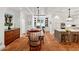 Spacious eat-in kitchen with terracotta tile, an island, and white cabinets at 508 Hastings Dr, Peachtree City, GA 30269