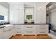 Laundry area with front loading appliances and black countertops at 508 Hastings Dr, Peachtree City, GA 30269