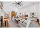 Spacious living room featuring a fireplace and vaulted ceilings at 508 Hastings Dr, Peachtree City, GA 30269