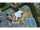 Aerial shot showcases the pool, playground, tennis courts, and clubhouse, enhancing community appeal at 1239 Side Step Trace, Lawrenceville, GA 30045