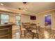Basement game room featuring a bar, seating, and game area at 1239 Side Step Trace, Lawrenceville, GA 30045