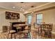 Basement game room with bar and seating area at 1239 Side Step Trace, Lawrenceville, GA 30045