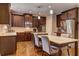 Eat in kitchen with stainless steel appliances, granite countertops, and dark cabinets at 1239 Side Step Trace, Lawrenceville, GA 30045