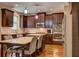 Modern kitchen with stainless steel appliances, granite countertops, and custom cabinets at 1239 Side Step Trace, Lawrenceville, GA 30045