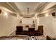 Home theater room with projector and comfortable seating at 1239 Side Step Trace, Lawrenceville, GA 30045