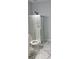 Clean bathroom featuring a glass shower and toilet in a bright space at 1349 Orchard Park Dr, Stone Mountain, GA 30083