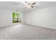 This large bedroom features plush carpet and a large window providing natural light at 845 Creek Trail Northwest Nw Trl, Kennesaw, GA 30144