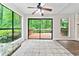 Bright dining area boasts large sliding glass doors leading to a wooden deck with lush green views at 845 Creek Trail Northwest Nw Trl, Kennesaw, GA 30144