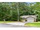 Single-story home with attached garage and spacious front yard at 845 Creek Trail Northwest Nw Trl, Kennesaw, GA 30144
