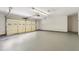 A spacious and clean two-car garage with painted flooring at 845 Creek Trail Northwest Nw Trl, Kennesaw, GA 30144