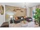 Inviting living room featuring a modern sectional sofa, stylish decor, and a unique accent wall at 3667 Peachtree Ne Rd # 16, Atlanta, GA 30319