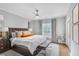 Serene main bedroom with a plush bed, soft lighting, and a calm ambiance at 3667 Peachtree Ne Rd # 16, Atlanta, GA 30319