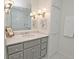 Bathroom features marble countertops, vanity with storage, and a stylish faucet at 40 Olde Ivy Ne Sq, Atlanta, GA 30342