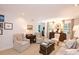 Comfortable living room featuring neutral armchairs, a vintage trunk, and stylish decor at 40 Olde Ivy Ne Sq, Atlanta, GA 30342