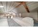 Upstairs bedroom with vaulted ceiling and lofted space perfect for guest or relaxation at 451 Wilderness Camp Rd, White, GA 30184