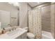 Well-designed bathroom featuring a shower/tub combo and single sink vanity at 884 Mayfield Rd, Milton, GA 30009