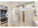 Modern bathroom with glass-enclosed shower, tile accents, and neutral decor at 884 Mayfield Rd, Milton, GA 30009