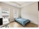 Bright bedroom with hardwood floors, and two windows providing ample natural light at 884 Mayfield Rd, Milton, GA 30009