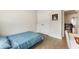 Well-lit bedroom with hardwood flooring and closet, showcasing the home's interior at 884 Mayfield Rd, Milton, GA 30009