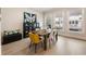 Bright and spacious dining area featuring modern decor and backyard views at 884 Mayfield Rd, Milton, GA 30009