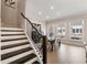 Bright and spacious dining area featuring modern decor and backyard views at 884 Mayfield Rd, Milton, GA 30009
