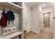 Convenient hallway with coat rack and bench seating, enhancing the home's functionality at 884 Mayfield Rd, Milton, GA 30009