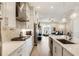 Bright, spacious kitchen with stainless steel appliances and a center island for dining and entertaining at 884 Mayfield Rd, Milton, GA 30009