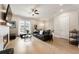 Inviting living room featuring a stylish fireplace, bright ambiance, and open floor plan at 884 Mayfield Rd, Milton, GA 30009