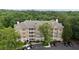 Aerial view of the complex displaying balconies, parking, and well-maintained grounds at 123 Ashford Cir, Atlanta, GA 30338