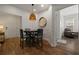 Cozy dining area features a round table with seating for four and stylish overhead lighting at 123 Ashford Cir, Atlanta, GA 30338