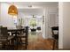 View from dining area into the living room with modern lighting at 123 Ashford Cir, Atlanta, GA 30338