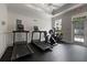 Well-equipped fitness center features treadmills and exercise bikes with ample lighting at 123 Ashford Cir, Atlanta, GA 30338