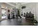 Spacious fitness center with weight training machines and mirrored walls at 123 Ashford Cir, Atlanta, GA 30338