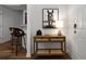 Hallway showcasing a stylish console table with decor and a striking horse art piece at 123 Ashford Cir, Atlanta, GA 30338